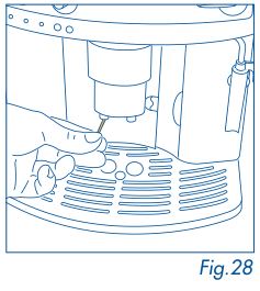 DeLonghi Magnifica - raspe los restos de café seco con una aguja