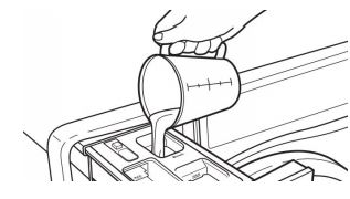 Manual del usuario de lavadoras de carga frontal Whirlpool - Adición de blanqueador de cloro líquido al dispensador de carga única